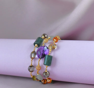 Bracciale multifilo con ametista, peridoto, quarzo citrino e cristallo di rocca dipinto con oro 24k
