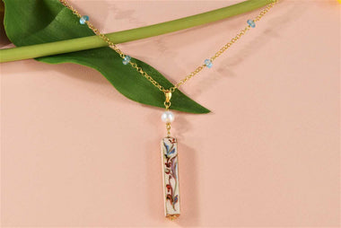 Girocollo con pendente dipinto a mano oro 24k, topazio e perla