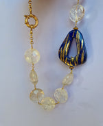 Collana con cristallo di rocca e lapislazzuli dipinto oro 24 kt