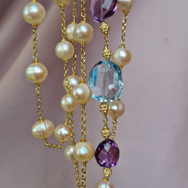 Collana lunga con perle barocche, topazio e ametista