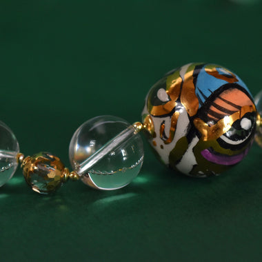 Collana donna con cristallo di rocca e ceramica dipinta a mano con oro 24k 