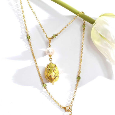 Collana con peridoto, perla e ceramica