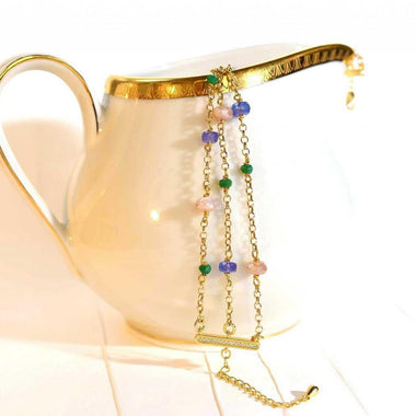 Bracciale con smeraldo, topazio e pietra di luna