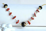 Collana di corallo acquamarina e onice