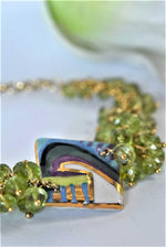 Bracciale con peridoto e ceramica dipinta a mano