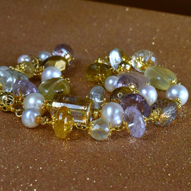 Bracciale multifilo in argento con cristallo di rocca dipinto oro 24k, ametista e quarzo