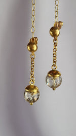 Orecchini a perno in argento 925 con cristallo di rocca dipinto oro 24k