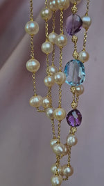 Collana lunga con perle barocche, topazio e ametista